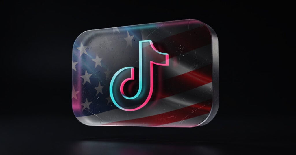 TikTok logo displayed over a stylized American flag, representing U.S. ownership and operations.